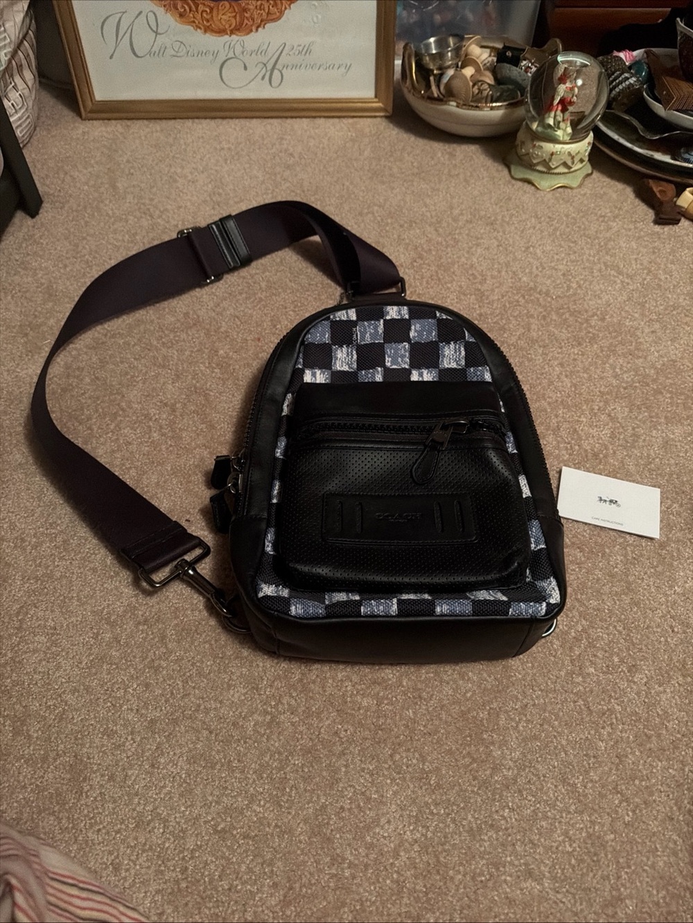 NWOT Coach F11165 Terrain Pack featuring graphic checker print on black leather